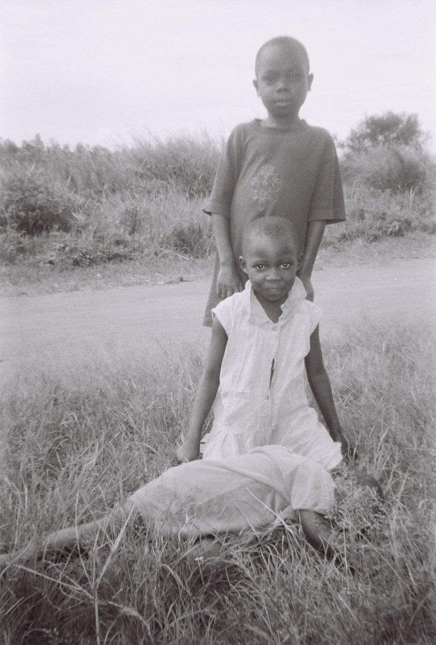 Congo Throwaway Camera Project- This child and the camera exploded his story telling. Nothing but questions remain. Is his brother laying down for the camera shoot on purpose? Is the child resting? Malaria abounds and this child talked of having fevers come and go. 